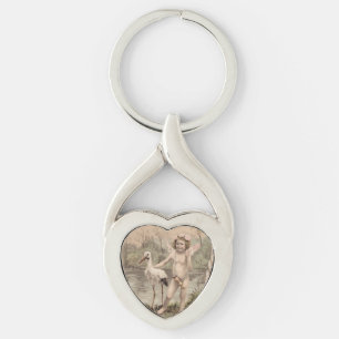 Porte-clés Cherubin Vintage avec Cigogne au Lac