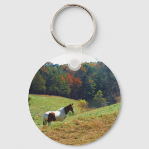Porte-clés Cheval blanc et Brown, étang d'automne
