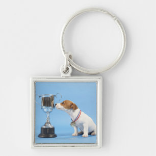 Porte-clés Chien avec le trophée