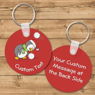 Porte-clés Christmas Penguin Getting a Snow Ball Keychain
