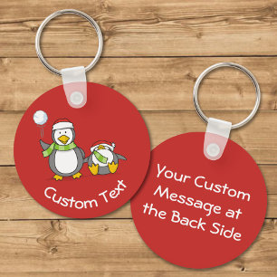 Porte-clés Christmas Snowballing Penguins Keychain