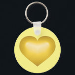 Porte-clés Clé de coeur fondu or<br><div class="desc">Ce porte - clé dispose d'un coeur doré et d'un centre blanchi à la chaux.</div>