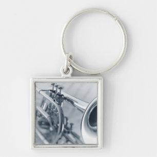Porte-clés Cornet sur des feuilles de musique