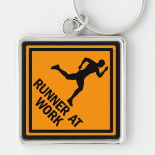 Porte-clés Coureur au travail