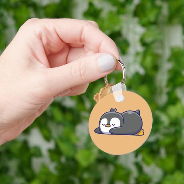 Porte-clés Cozy Little Penguin Nap (main)