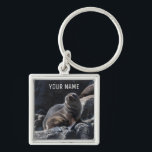 Porte-clés Cute Baby Seal on the Rocks Tasmania Australia<br><div class="desc">Fur seals are the cutest and curious animals. And they are incredibly playful. This unique key chain features a photo a baby fur seal enjoying the sun on the rocks around Tasman Island in Tasmania, Australia. You can personalize it with your own name or text. Or, if you just want...</div>
