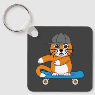 Porte-clés Cute Orange Chat sur Skateboard Cartoon