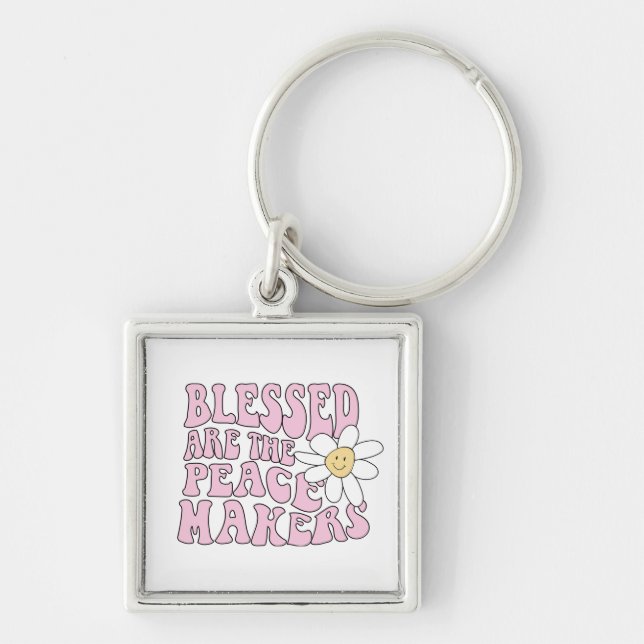 Porte-clés Daisy et les artisans de la paix Slogan (Devant)
