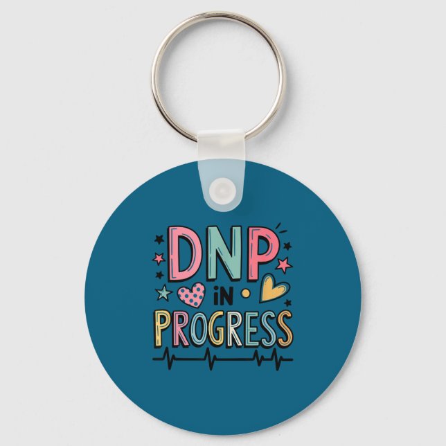 Porte-clés De la chemise Dnp Progress Directeur Étudiante en  (Recto)