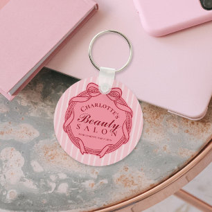 Porte-clés de salon de beauté à cadre orné rose