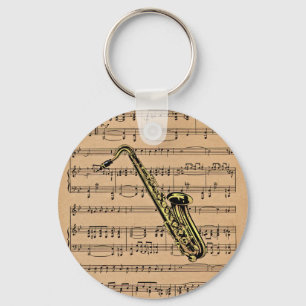 Porte-clés ~ de saxophone avec l'arrière - plan de musique d