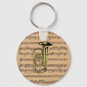 Porte-clés ~ de tuba avec l'arrière - plan de musique de