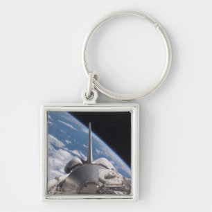 Porte-clés Découverte de navette spatiale backdropped par la