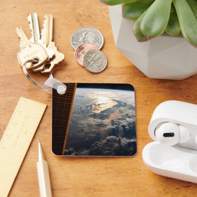 Porte-clés Des Poutres Sunglint Au Large De La Mer Des Célèbe (Bureau)