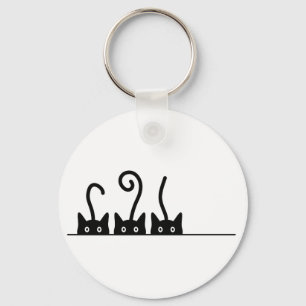 Porte-clés Dessin de la ligne droite. Trois chatons. Journée