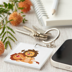 Porte-clés Deux lions de dessin animé mignons et joueurs