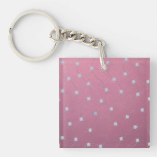 Porte-clés Diamant bleu piqué sur le cuir rose