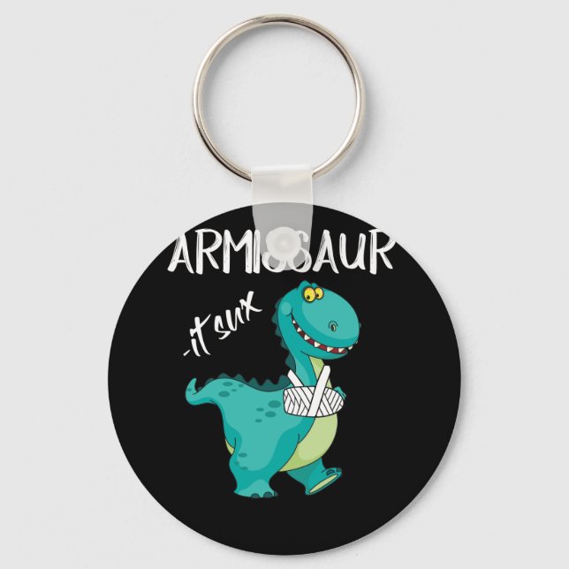 Porte-clés Dinosaure Arme brisé Il Sux (Recto)