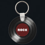 Porte-clés disque vinyle rock<br><div class="desc">Un disque vinyle en noir et rouge. Vous pouvez aller sur le bouton "customiser" et modifier le design en changeant le mot "rock"</div>
