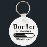 Porte-clés Docteur en cours Veuillez patienter<br><div class="desc">"Docteur en cours,  Veuillez patienter" Porte - clé parfait pour les futurs Médecins,  Vous pouvez le donner à votre Docteur en faisant des amis!</div>