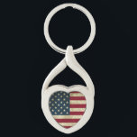 Porte-clés Drapeau américain<br><div class="desc">Forme : Coeur tordu Personnalisez ce porte - clé métallique couleur argent avec vos images et texte et portez vos proches avec vous où que vous alliez! Disponible dans 4 modèles différents, vos images et designs seront imprimés dans une encre vibrante sur un encart métallique qui adhère directement sur le...</div>