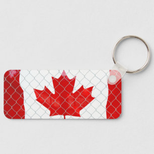 Porte-clés Drapeau canadien. Clôture à mailles losangées. Rus