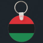 Porte-clés Drapeau rouge, noir et vert<br><div class="desc">Les 3 couleurs panafricaines sur le drapeau représentent : le rouge : le sang qui unit tous les peuples d'ascendance africaine noire, et versé pour la libération ; le NOIR : les noirs dont l'existence en tant que nation, bien qu'elle ne soit pas un État-nation, est affirmée par l'existence du...</div>