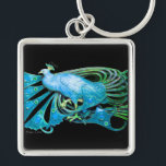 PORTE-CLÉS ÉLÉGANT PEACOCK BLEU TURQUOISE EN NOIR<br><div class="desc">Design numérique par Bulgan Lumini. Partie de la nouvelle collection ARCADIA.</div>