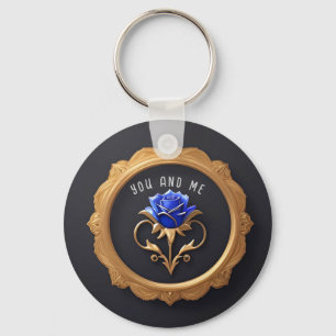 Porte-clés Elégant Rose bleu en cadre doré avec détails ornés