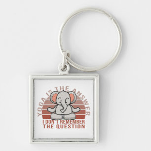 Porte-clés Éléphant drôle et mignon faisant du yoga. Concepti