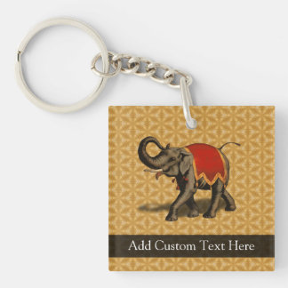 Porte-clés Eléphant rouge et or
