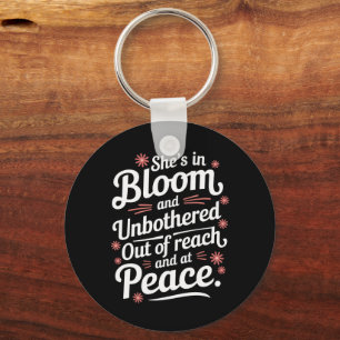 Porte-clés Elle est en fleur et ne s’embêtent pas de sa porté