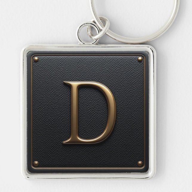 Porte-clés 🔑 Emblème encadré D en cuir noir et or 🟡 (Devant)