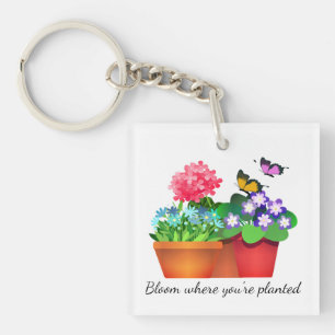Porte-clés en acrylique Jardin de fleurs papillon
