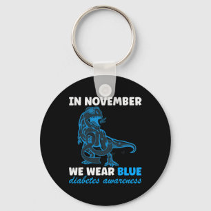 Porte-clés En Novembre Nous Portons Bleu T-rex