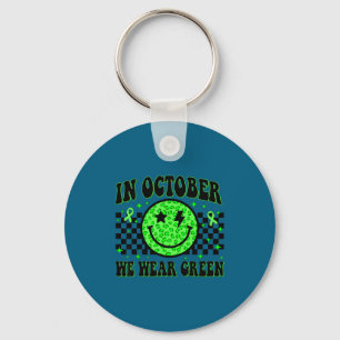 Porte-clés En porter octobre ruban vert visage souriant