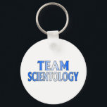 Porte-clés Équipe de scientologie<br><div class="desc">Support Team Scientology avec ce design bleu et gris impressionnant. Faites une déclaration audacieuse au monde et montrez de quel côté vous êtes !</div>