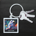 Porte-clés Espace astronaute moderne coloré Nom personnalisé<br><div class="desc">Colorful Modern Astronaut Space Personnalisé Nom Porte - clé dispose d'un astronaute flottant dans l'espace avec des planètes et des nappes colorées et personnalisées avec votre nom dans la typographie script moderne. Parfait comme cadeau pour les amoureux de l'espace, famille et amis pour anniversaire, Noël, vacances, Fête des pères, frère,...</div>