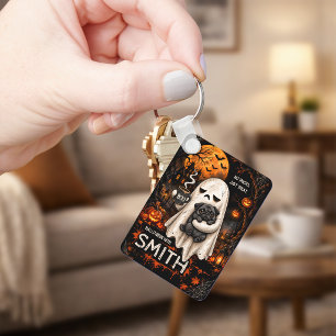 Porte-clés Fantôme Grincheux Tenant un Chien Pug Noir Meh Hal