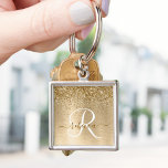 Porte-clés Faux Gold brossé Parties scintillant métallique Im<br><div class="desc">Personnalisez facilement ce design porte - clé chic et branché avec une jolie parties scintillant dorée brillante sur un arrière - plan métallique brossé à l'or.</div>