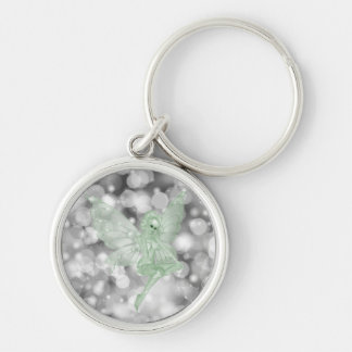 Porte-clés Fée verte sur fond Bokeh
