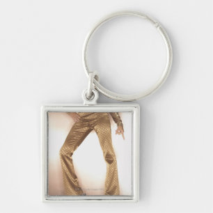 Porte-clés Femme de hanche dans la danse de disco d'or