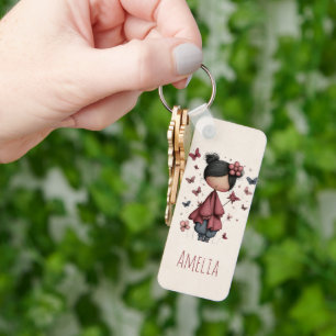 Porte-clés Fille avec baguette magique et papillons Mignonne