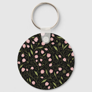 Porte-clés Fleur mignonne, rose sur noir avec motif répétitif