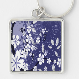 Porte-clés Fleurs blanches sur la grunge bleue
