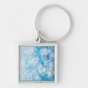 Porte-clés Flocons de Noël sur un fond bleu