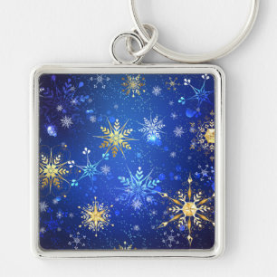 Porte-clés Fond bleu de Noël avec flocons d'or