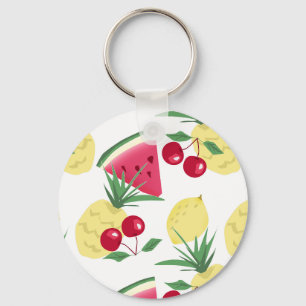 Porte-clés Fruits et baies vitrés sur blanc.