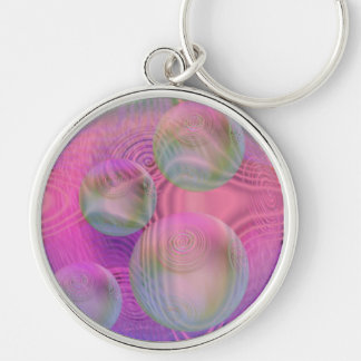 Porte-clés Galaxie fuchsia et violette de l'écoulement