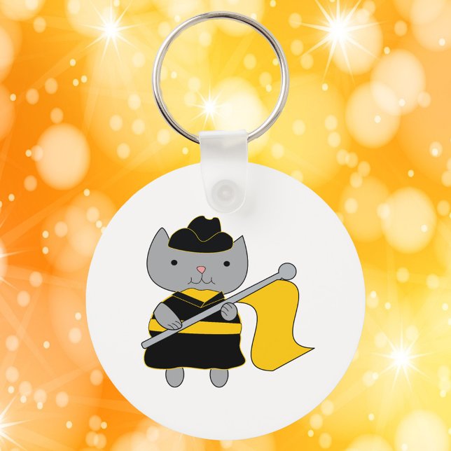 Porte-clés Garde de couleur Kawaii Chat Noir Jaune (A keychain featuring a cute gray cat in a black & yellow color guard uniform.)